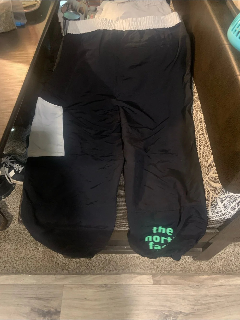 The North Face Black Sweatpants with White Pocket Panel and Green Logo!